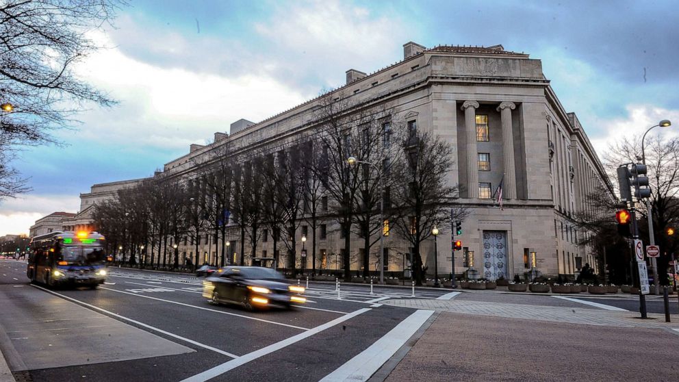 PHOTO: The Department of Justice building is bathed in morning light at sunrise in Washington, Feb. 14, 2020.