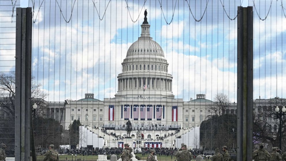 PHOTO: Heightened security is seen in front of the United States Capitol on the morning of Joe Biden's Inauguration as the 46th President of the United States, Jan. 20, 2021 in Washington. The mall was closed to the general public due to safety concerns.
