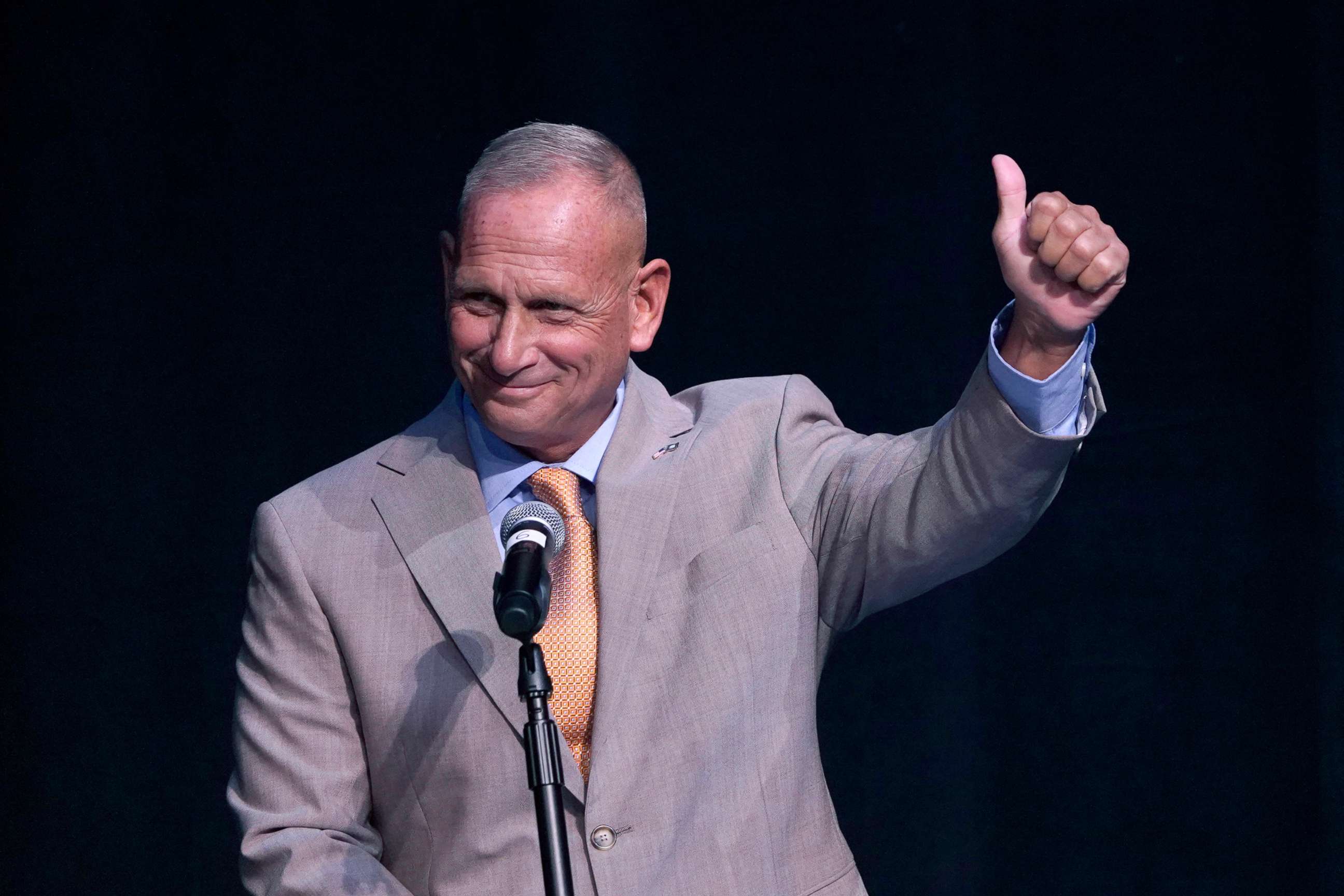 PHOTO: New Hampshire Republican U.S. Senate candidate Don Bolduc gestures as he is introduced during a debate, on Sept. 7, 2022, in Henniker, N.H.