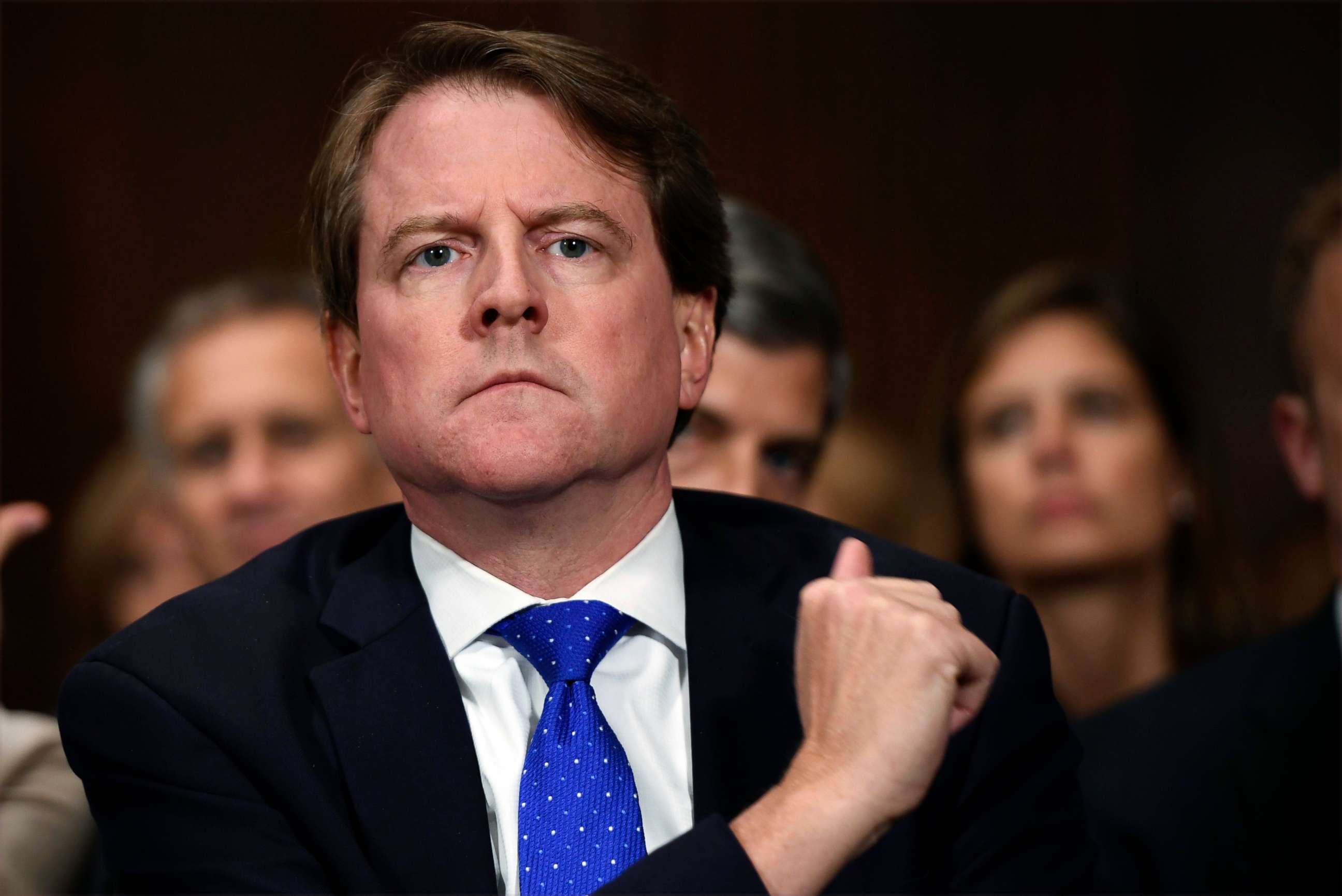 PHOTO: White House counsel Don McGahn listens as Supreme court nominee Brett Kavanaugh testifies before the Senate Judiciary Committee on Capitol Hill in Washington, Sept. 27, 2018.