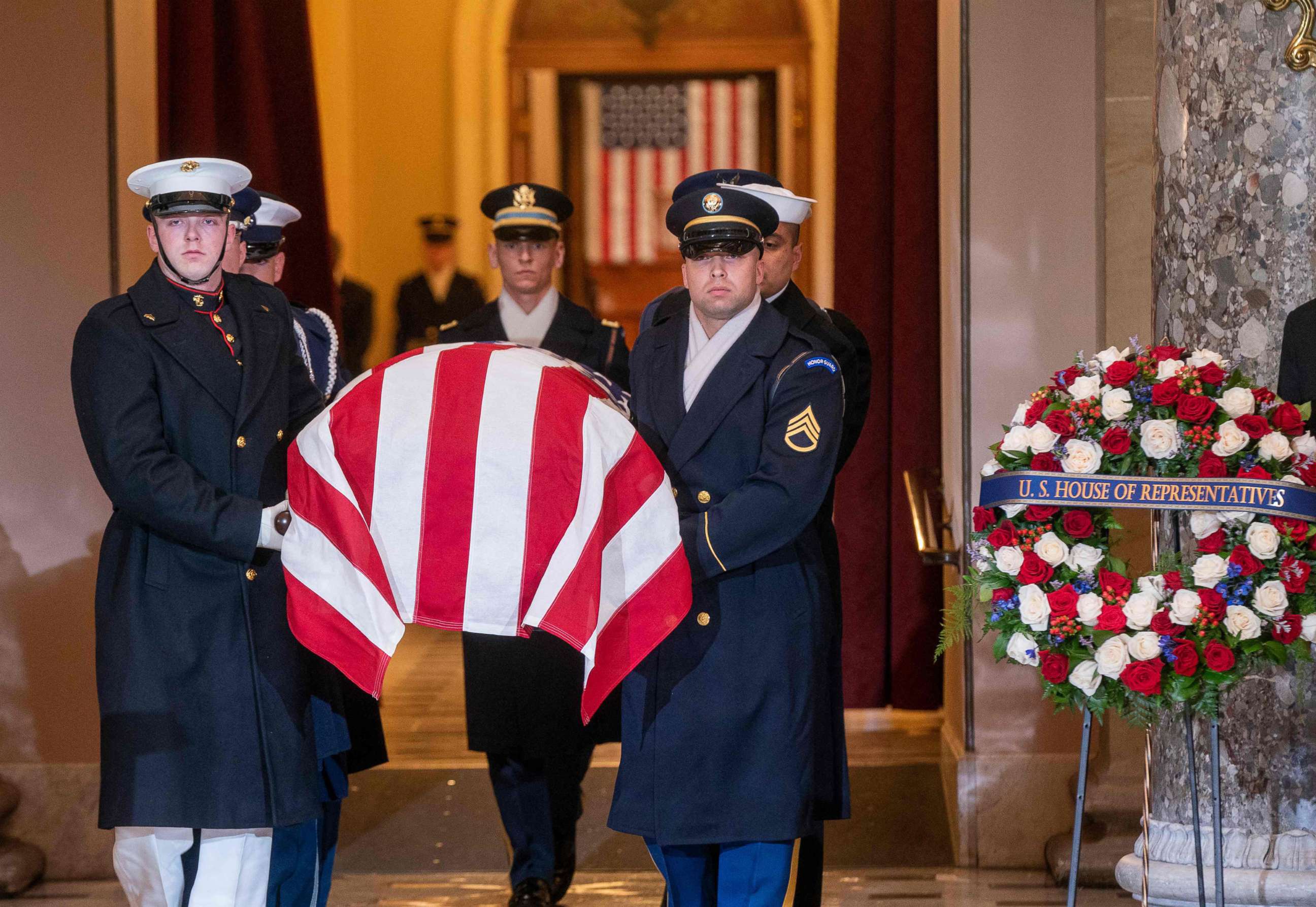 PHOTO: A military honor guard carries the casket of Rep. Don Young, the longest-serving Republican in House history, to lie in state at the US Capitol in Washington on March 29, 2022.