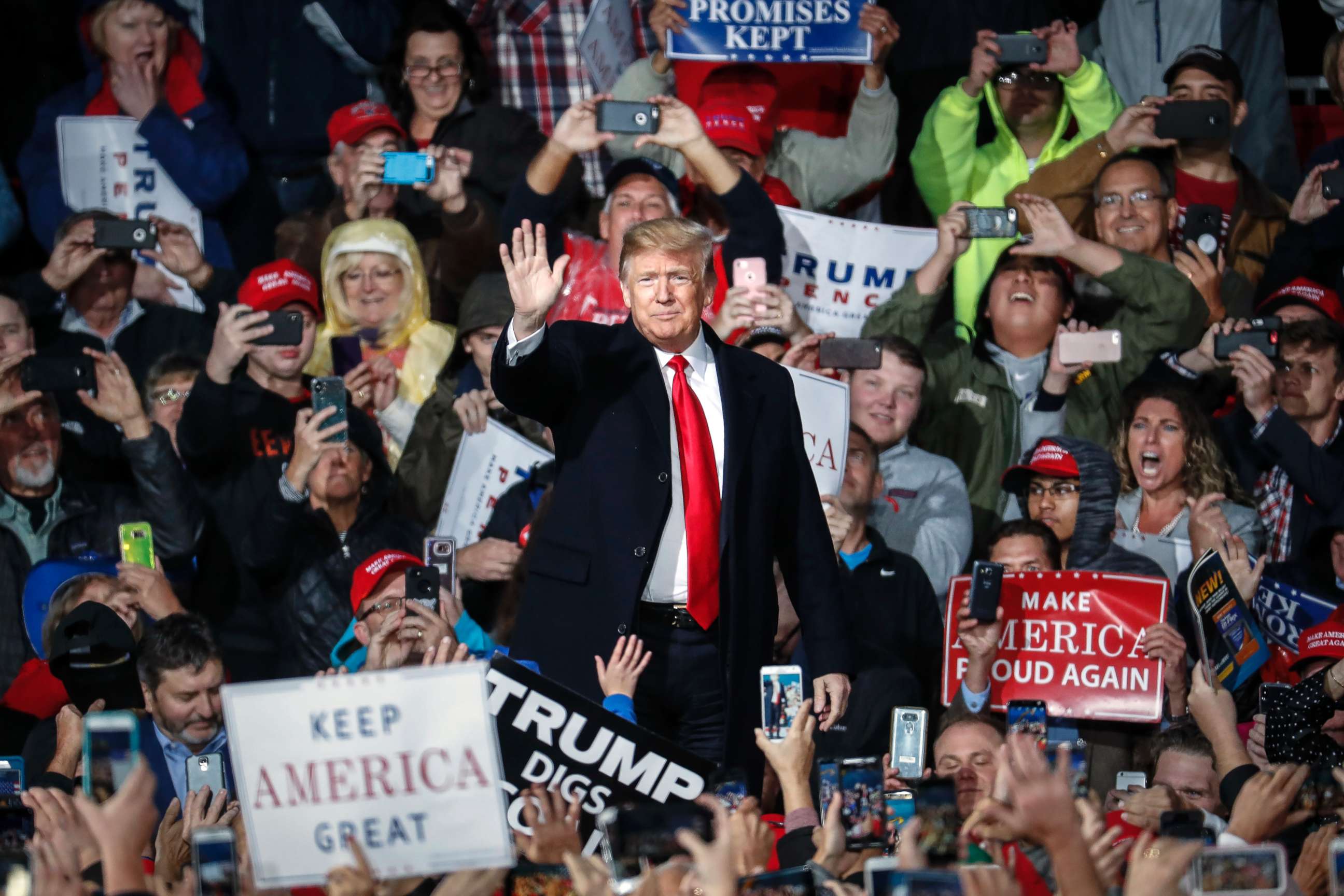PHOTO: President Donald Trump waves to the crowd at a rally, Oct. 12, 2018, in Lebanon, Ohio.