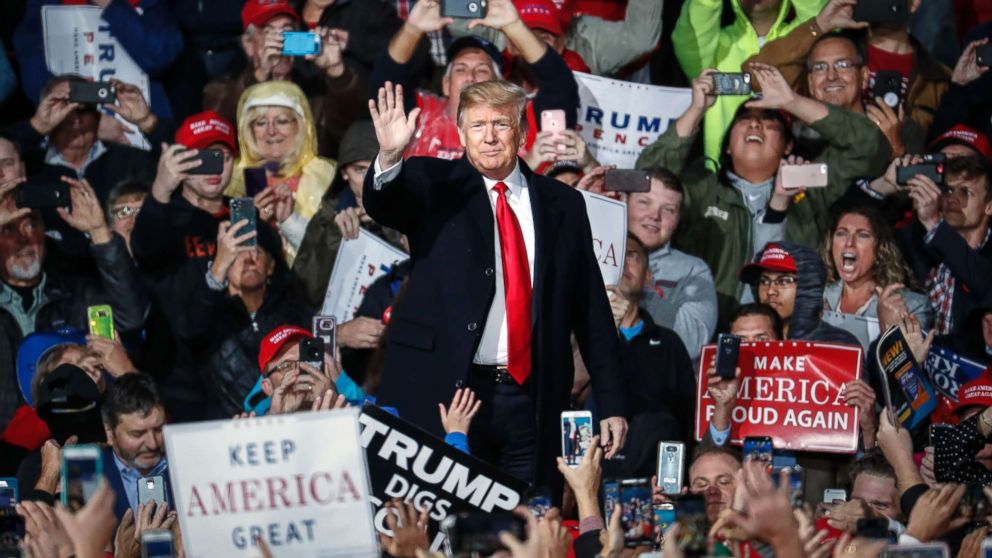 PHOTO: President Donald Trump waves to the crowd at a rally, Oct. 12, 2018, in Lebanon, Ohio.