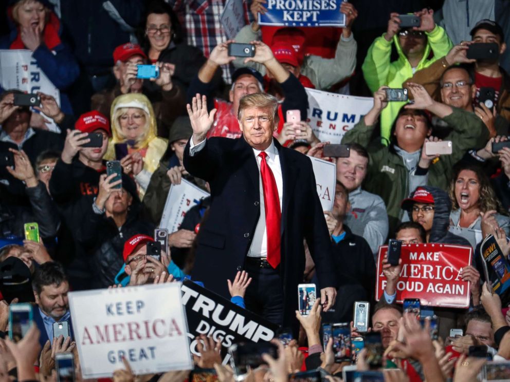 PHOTO: President Donald Trump waves to the crowd at a rally, Oct. 12, 2018, in Lebanon, Ohio.