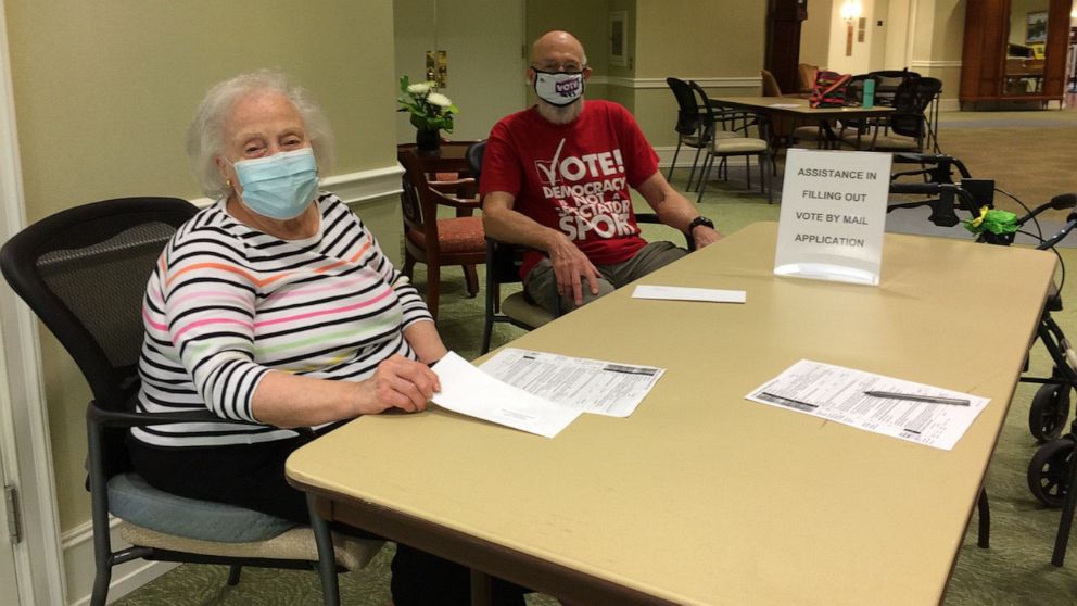 PHOTO: Independent living residents Don Gurney and Jean Bacon host a recent voter registration signup event at Goodwin House Bailey’s Crossroads in Falls Church, Virginia.