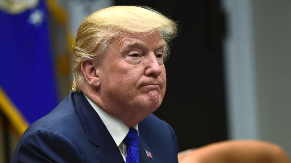 President Donald Trump pauses as the media departs after he spoke in the Roosevelt Room of the White House in Washington, Nov. 28, 2017.