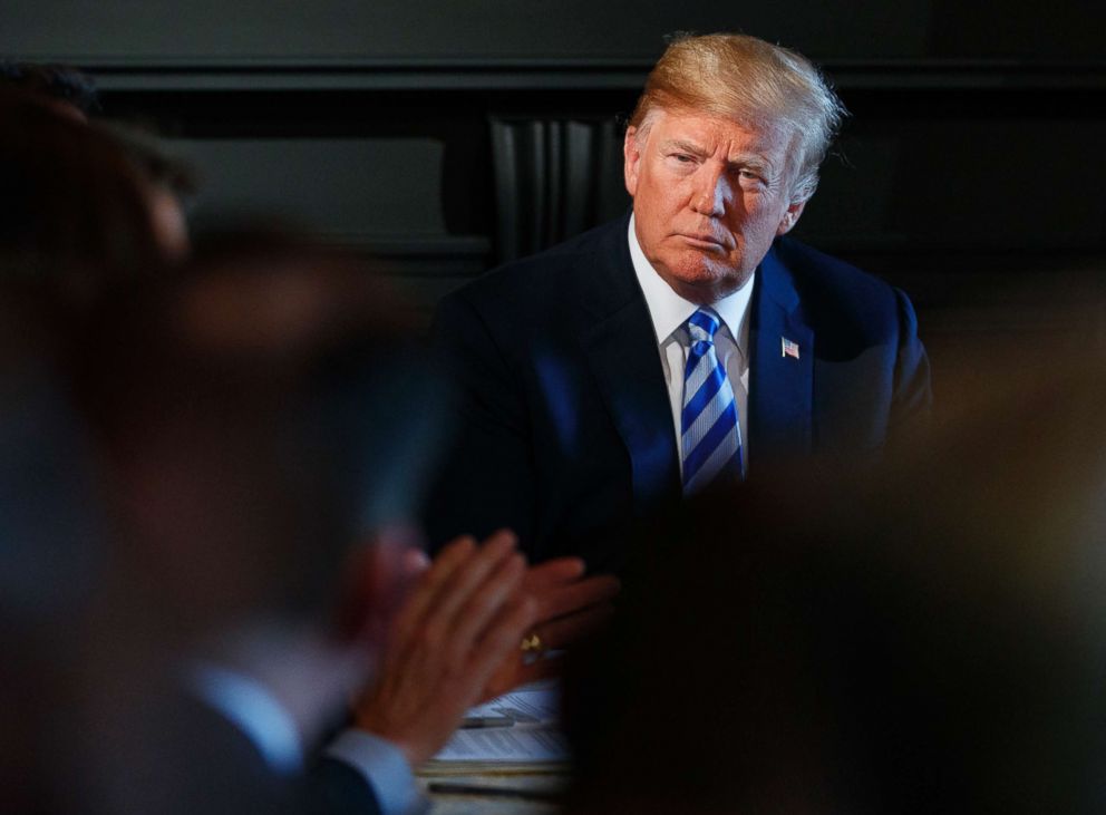 PHOTO: President Donald Trump listens during a meeting with state leaders about prison reform, Aug. 9, 2018, at Trump National Golf Club in Bedminster, N.J.