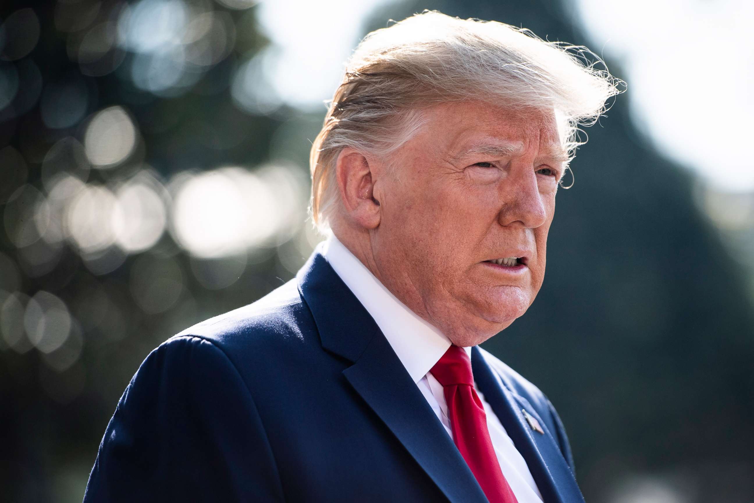 PHOTO: President Donald J. Trump stops to talk to reporters and members of the media as he walks to Marine One to depart from the South Lawn at the White House on Wednesday, Aug 07, 2019 in Washington.