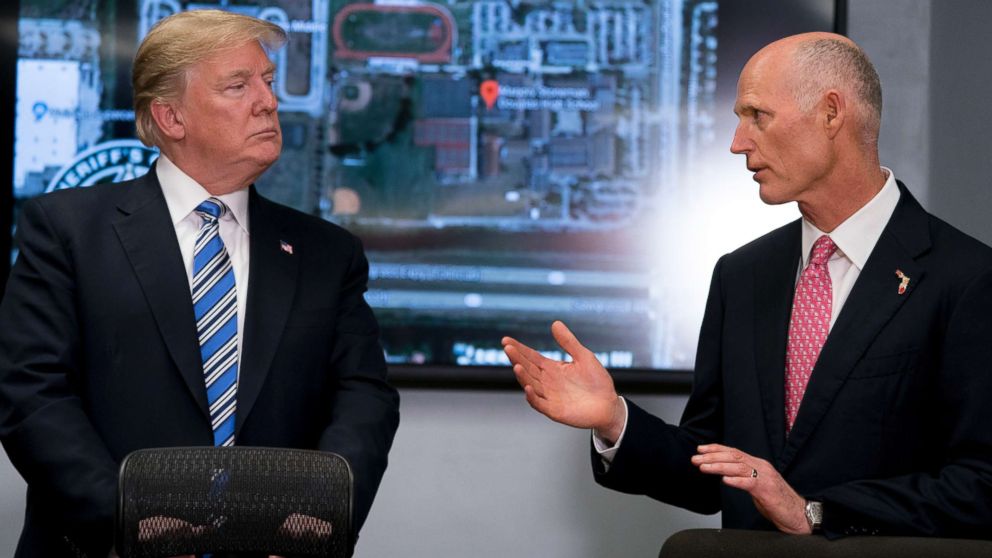 PHOTO: Florida Gov. Rick Scott accompanied by President Donald Trump speaks at Broward County Sheriff's Office in Pompano Beach, Fla., Feb. 16, 2018.