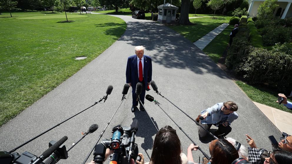PHOTO: President Donald Trump speaks to members of the media before boarding Marine One on the South Lawn of the White House on April 29, 2025 in Washington, DC.