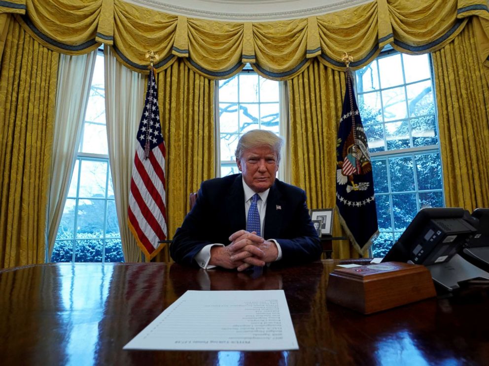 PHOTO: President Donald Trump sits at the Resolute desk during an interview with Reuters at the White House in Washington, D.C., Jan. 17, 2018.