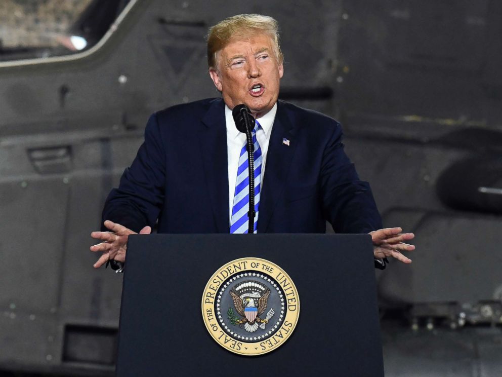 PHOTO: President Donald Trump speaks before signing a $716 billion defense policy bill named for Sen. John McCain in Fort Drum, N.Y., Aug. 13, 2018.