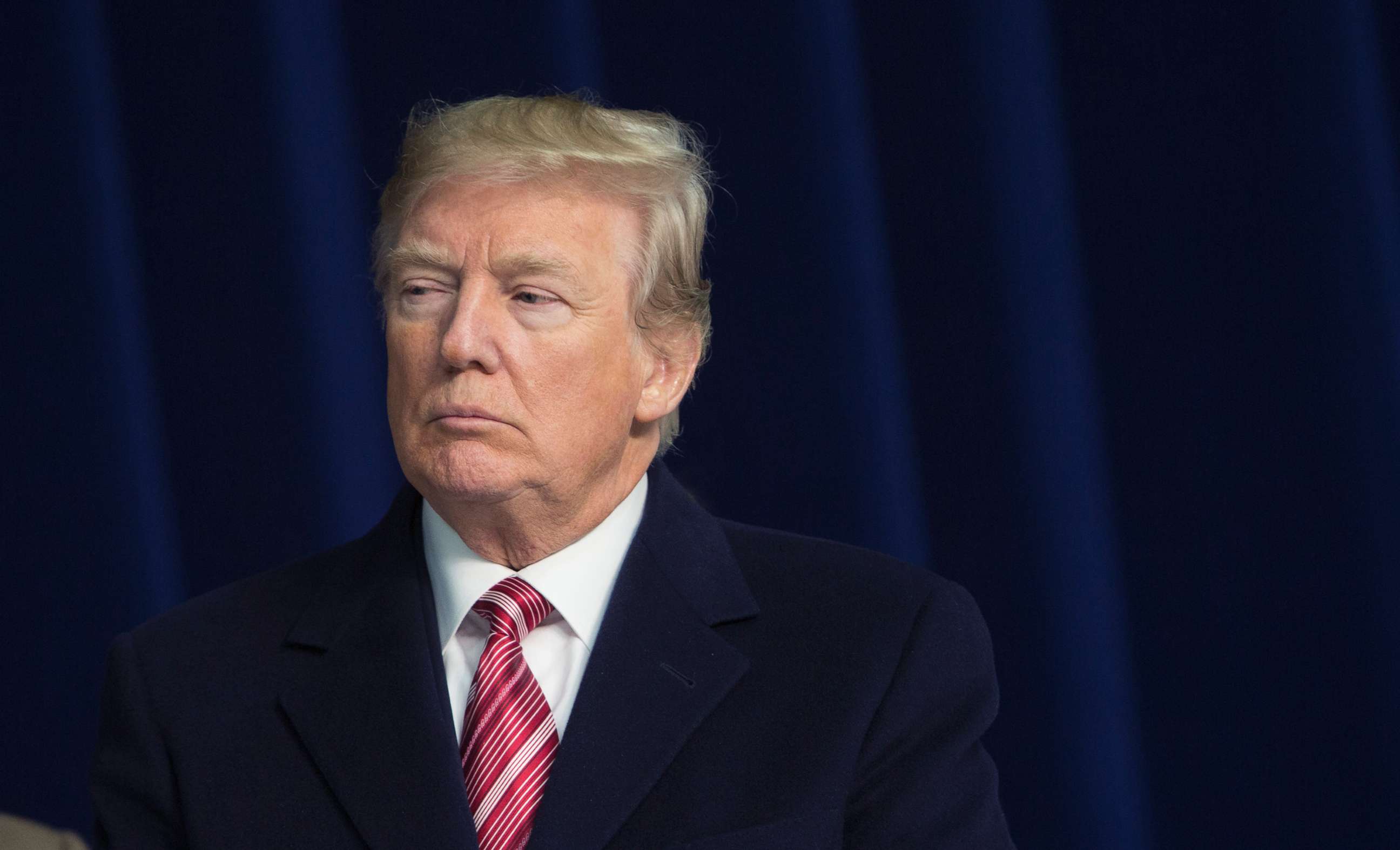 PHOTO: President Donald Trump listens as Republican leadership takes turns speaking to the media at Camp David in Thurmont, Md., Jan. 6, 2018.