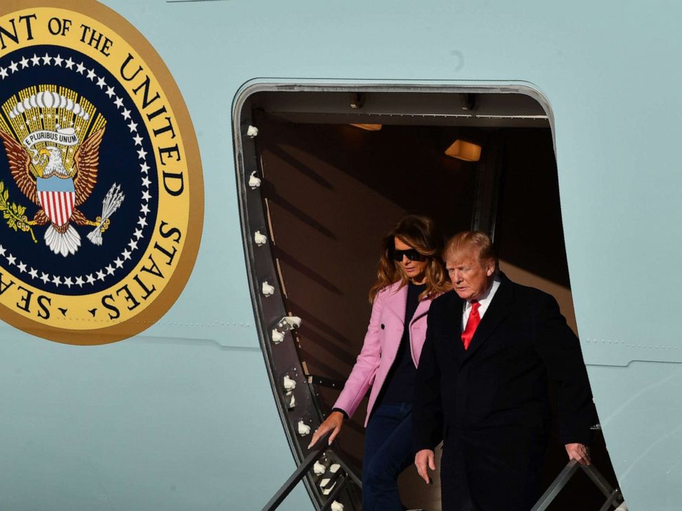 PHOTO: President Donald Trump and first lady Melania Trump step off Air Force One upon arrival at Andrews Air Force Base in Maryland.