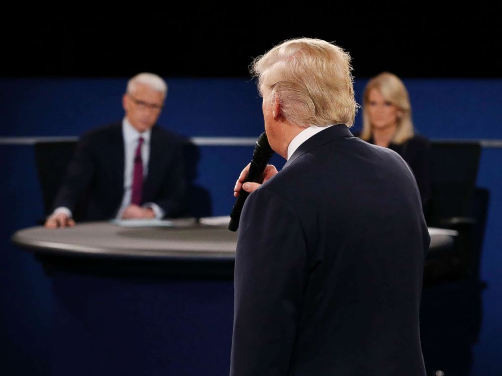 PHOTO: Moderators Anderson Cooper and Martha Raddatz listen as Republican presidential nominee Donald Trump speaks during the second debate at Washington University in St. Louis, Missouri on Oct. 9, 2016.