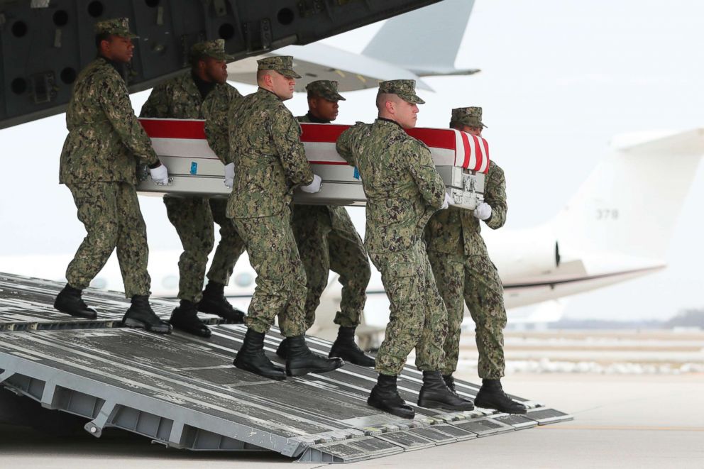 PHOTO: A U.S. Navy carry team moves a transfer case containing the remains of Scott A. Wirtz at Dover Air Force Base, Del., Jan. 19, 2019.