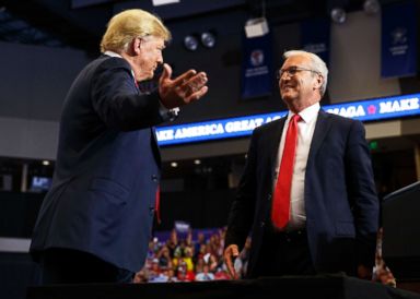 PHOTO: President Donald Trump kisses the candidate for Senate Representative, Kevin Cramer, at a campaign rally on June 27, 2018, in Fargo, New Jersey.