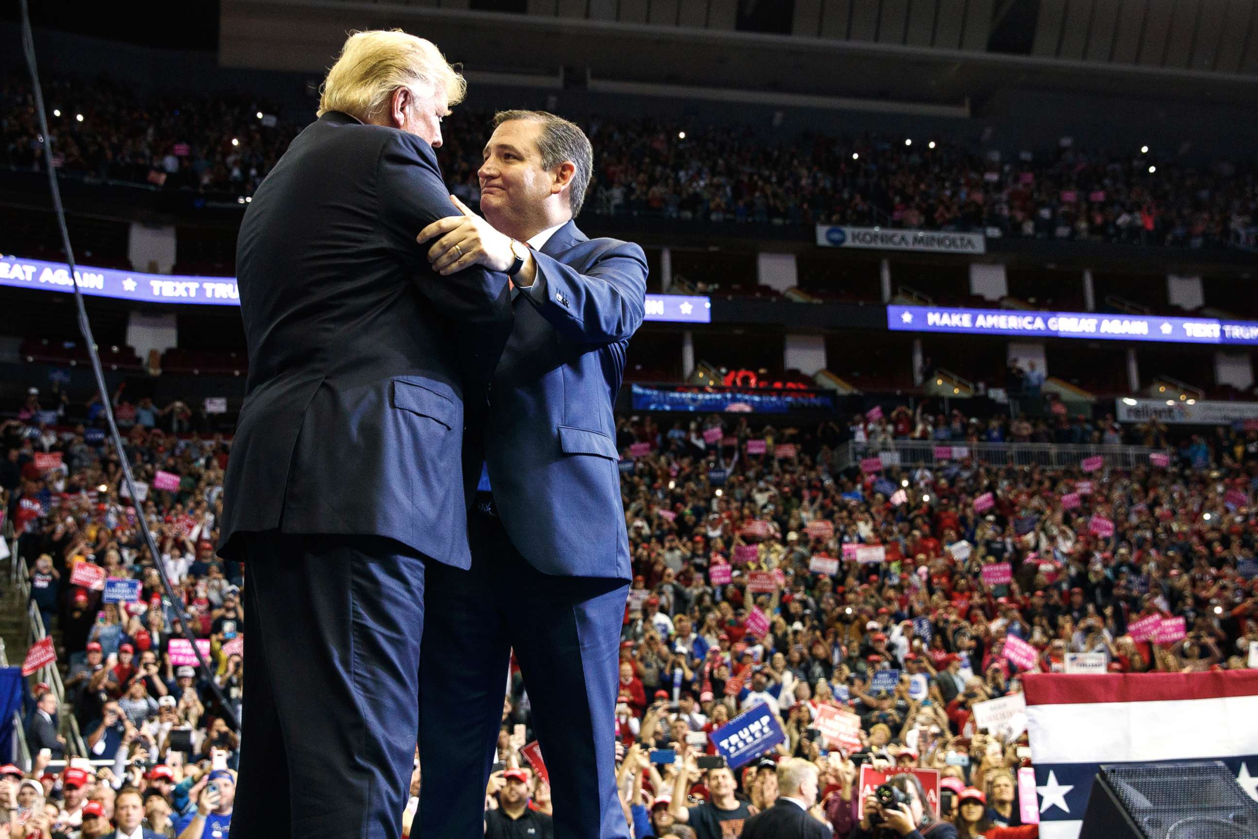PHOTO: President Donald Trump is greeted by Sen. Ted Cruz as he arrives for a campaign rally on Oct. 22, 2018, in Houston.