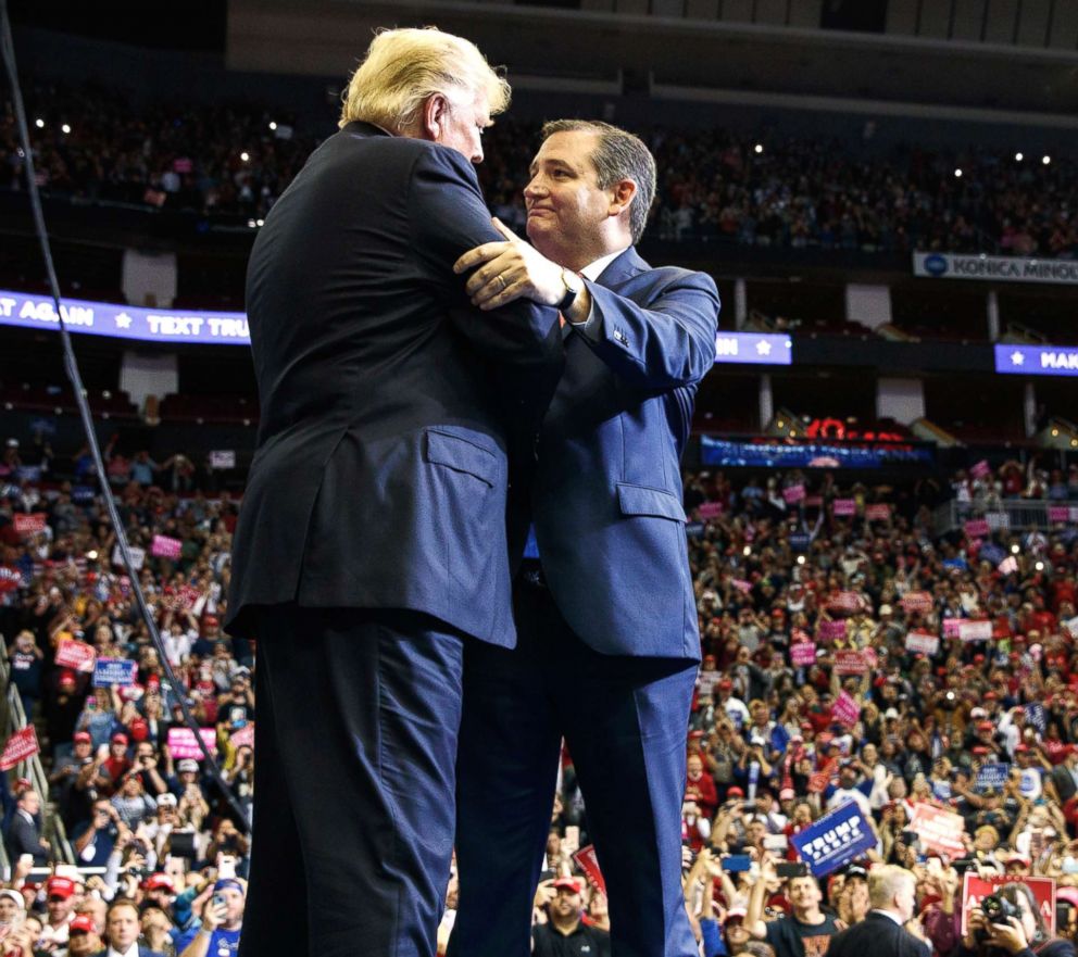 PHOTO: President Donald Trump is greeted by Sen. Ted Cruz as he arrives for a campaign rally on Oct. 22, 2018, in Houston.