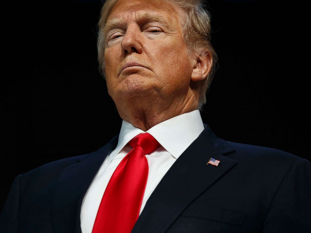 PHOTO: President Donald Trump listens as he is introduced to deliver a speech to the World Economic Forum, Jan. 26, 2018, in Davos.