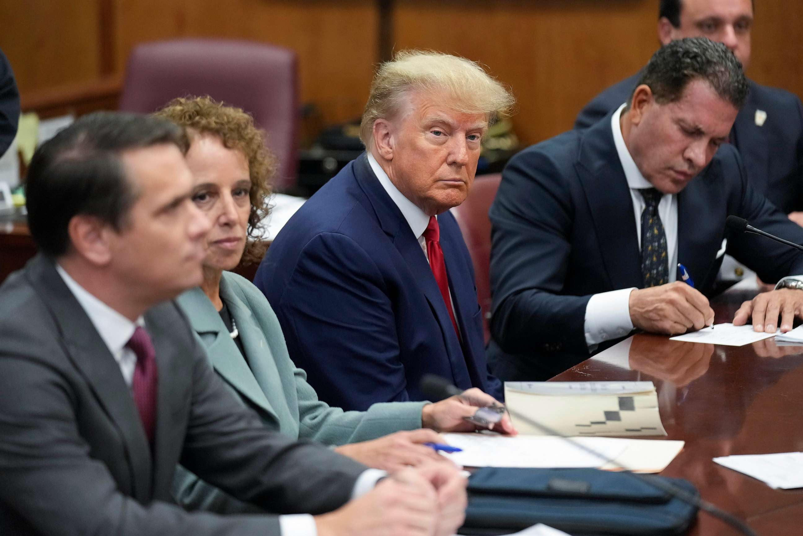 PHOTO: Former President Donald Trump sits at the defense table with his legal team in a Manhattan court, April 4, 2023, in New York.