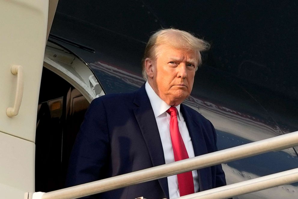 PHOTO: Former President Donald Trump steps off his plane as he arrives at Hartsfield-Jackson Atlanta International Airport, Aug. 24, 2023, in Atlanta.