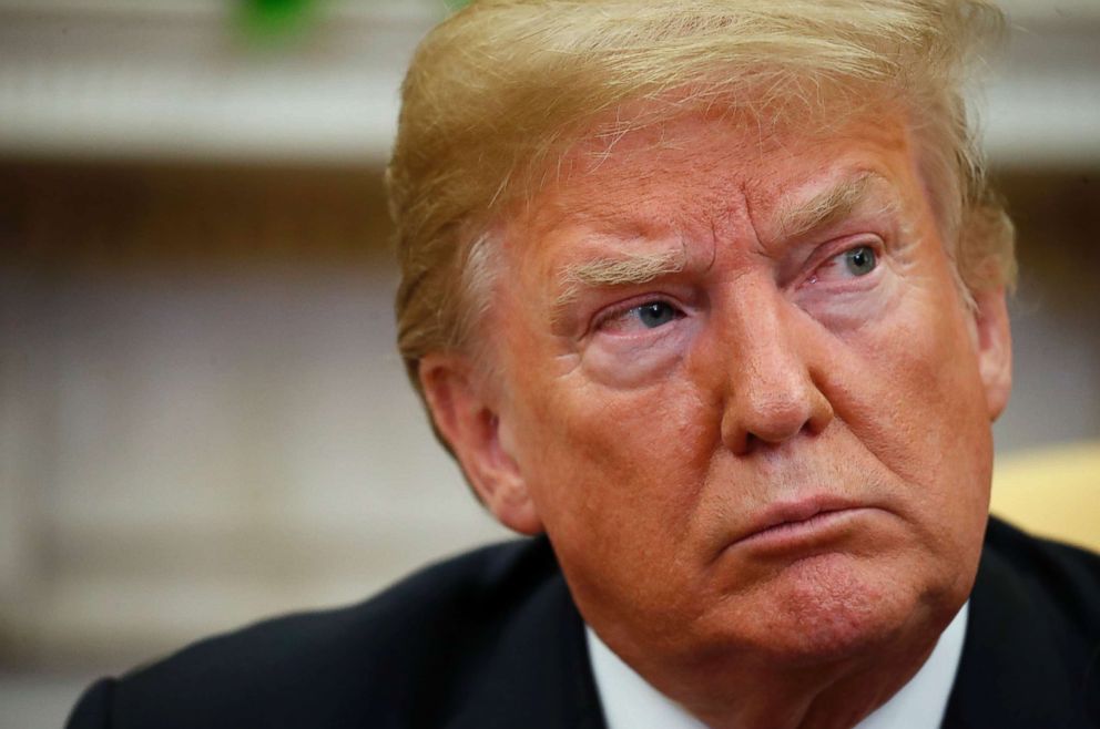 PHOTO: President Donald Trump listens during a meeting with Joshua Holt, who was recently released from a prison in Venezuela, in the Oval Office of the White House, May 26, 2018, in Washington, D.C.