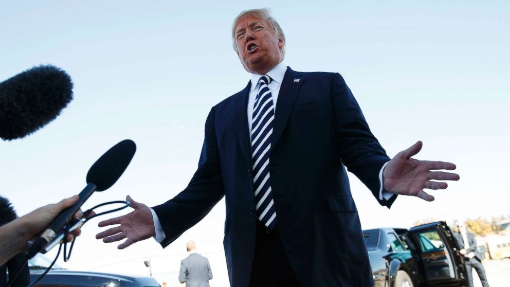 PHOTO: President Donald Trump speaks to media after a campaign rally before boarding Air Force One at Elko Regional Airport, Oct. 20, 2018, in Elko, Nev., en route to Washington.