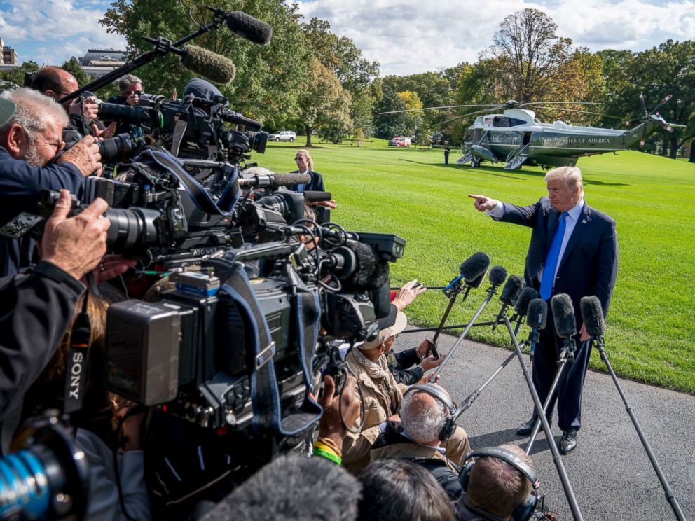 PHOTO: President Donald Trump calls on a reporter before boarding Marine One on the South Lawn of the White House in Washington, Oct. 25, 2017, for a short trip to Andrews Air Force Base, Md. and then on to Dallas.