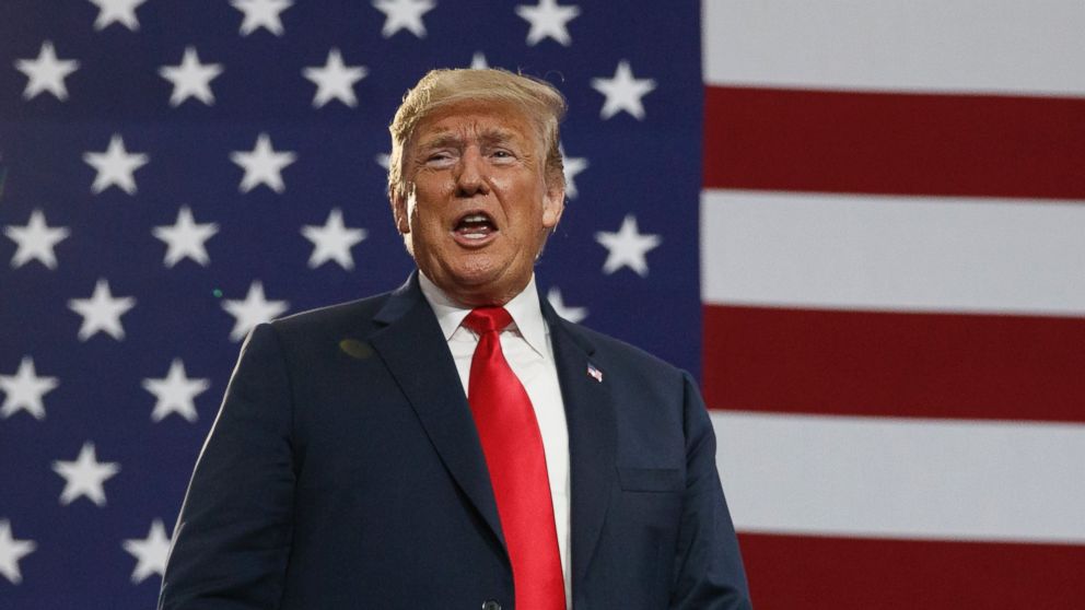 In this Saturday, Aug. 4, 2018 file photo, President Donald Trump speaks at a rally at Olentangy Orange High School in Lewis Center, Ohio.