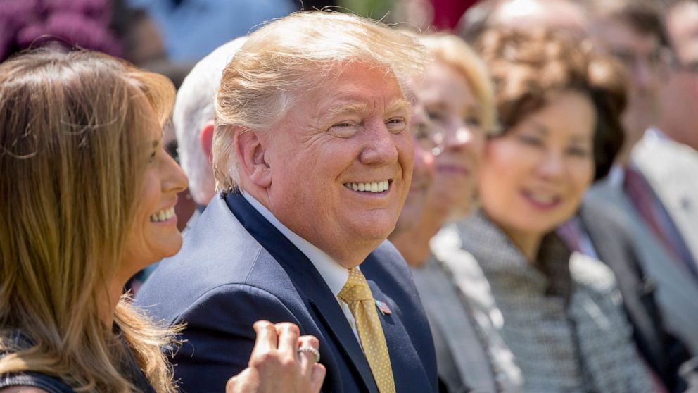 PHOTO: President Donald Trump and First lady Melania Trump, left, smile during a one year anniversary event for her Be Best initiative in the Rose Garden of the White House, Tuesday, May 7, 2019, in Washington.
