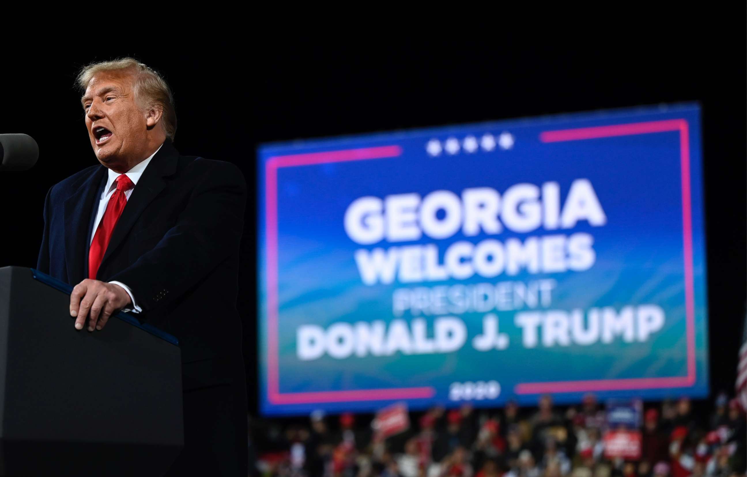 PHOTO: (FILES) In this file photo taken on December 05, 2020 US president Donald Trump speaks at a rally to support Republican Senate candidates at Valdosta Regional Airport in Valdosta, Georgia. 