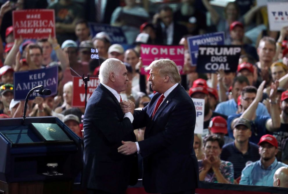 PHOTO: U.S. Rep. Mike Kelly, a Pennsylvania Republican nominee for the U.S. Senate, and President Donald Trump shake hands during a campaign rally in Erie, Pa., Oct. 10, 2018.