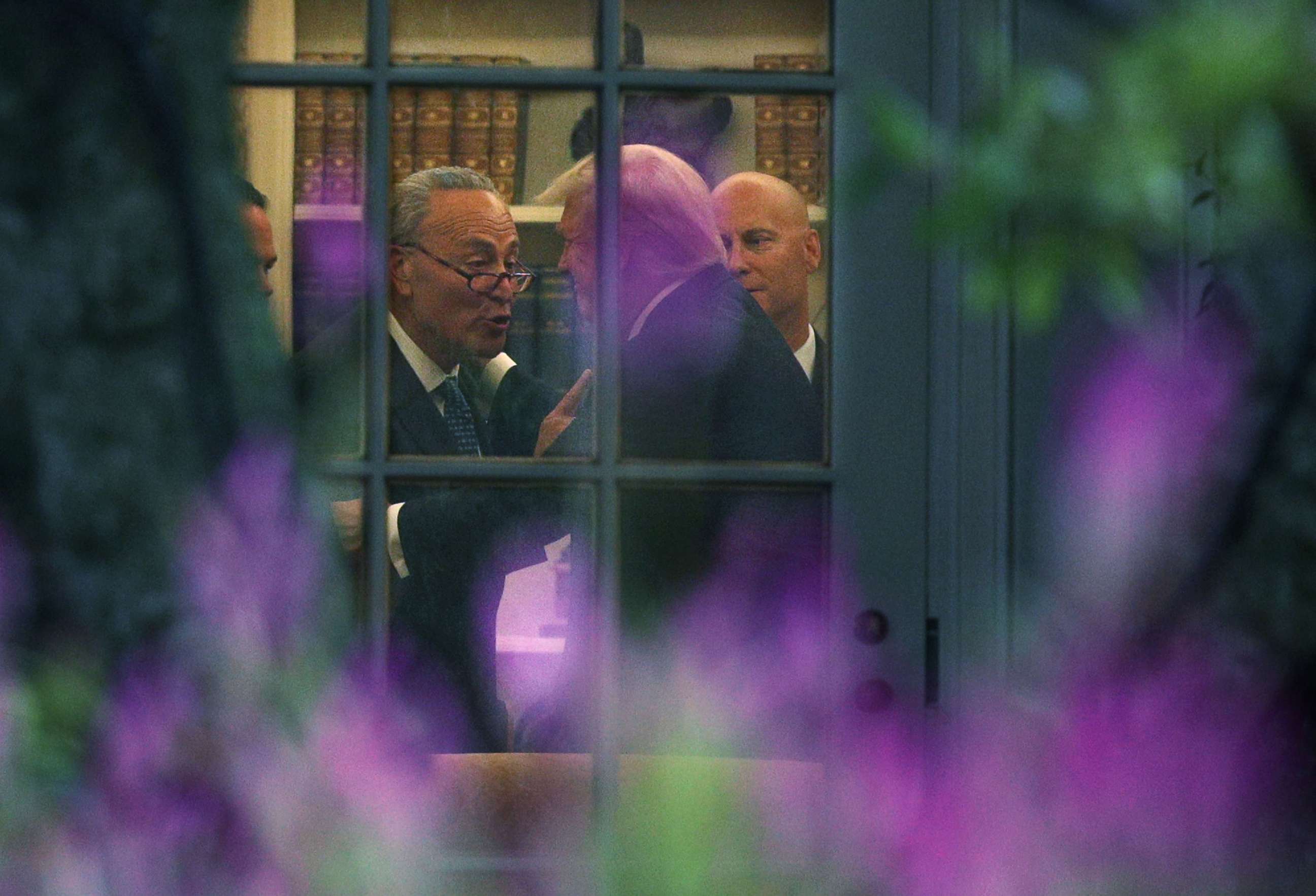 PHOTO: Senate Minority Leader Chuck Schumer makes a point to President Donald Trump in the Oval Office prior to his departure from the White House Sept. 6, 2017 in Washington.