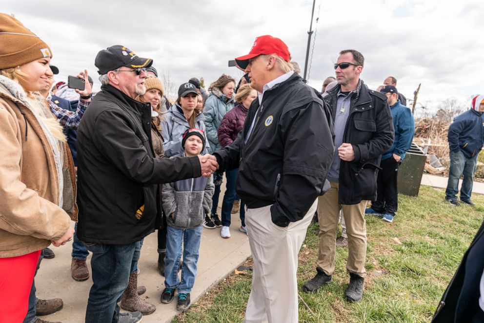 PHOTO: In an official handout photo from the White House, President Donald J. Trump meets with residents from the tornado ravaged neighborhood near Cookeville, Tenn., Friday, March 6, 2020, where a tornado struck early on March 3rd.