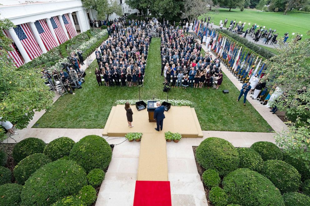 PHOTO:  President Donald Trump stands with Judge Amy Coney Barrett as they arrive for a news conference to announce Barrett as his nominee to the Supreme Court, in the Rose Garden at the White House, Sept. 26, 2020.