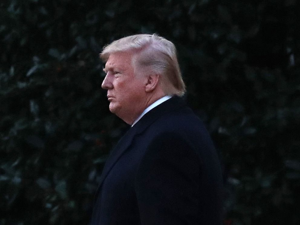 PHOTO: President Donald Trump walks out of the Oval Office prior to his departure for a campaign event in Battle Creek, Mich., Dec. 18, 2019, at the White House in Washington.