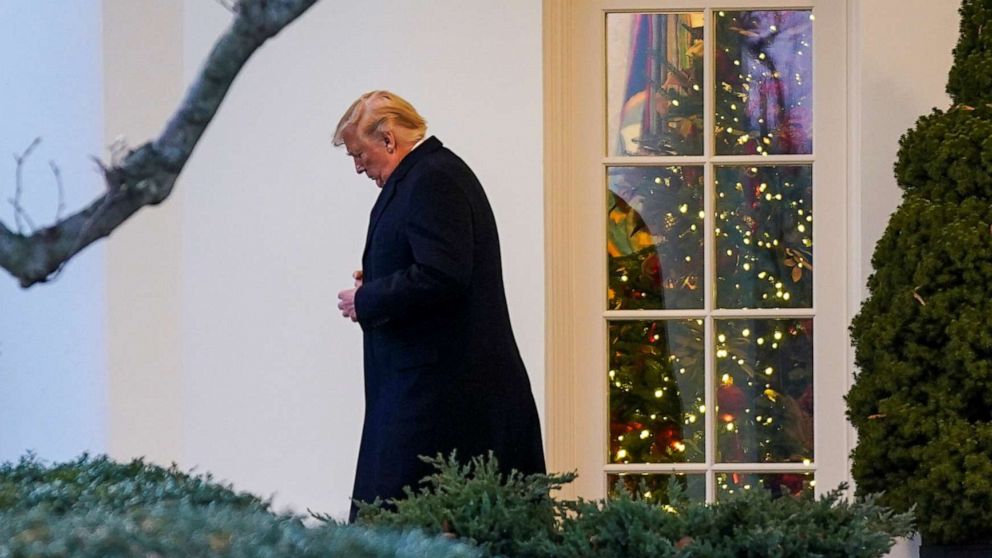 PHOTO: President Donald Trump exits the Oval Office as he departs for Michigan from the White House in Washington, Dec. 18, 2019.