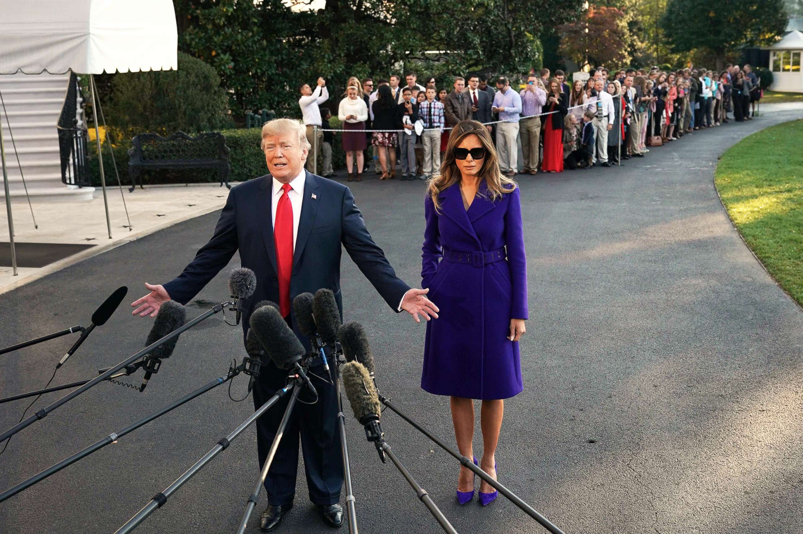 PHOTO: President Donald Trump and First Lady Melania Trump speak to the press as they make their way to board Marine One before departing from the South Lawn of the White House, Nov. 3, 2017.