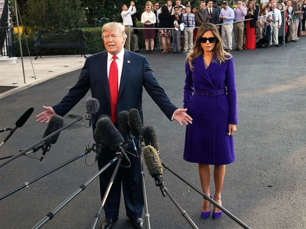 PHOTO: President Donald Trump and First Lady Melania Trump speak to the press as they make their way to board Marine One before departing from the South Lawn of the White House, Nov. 3, 2017.
