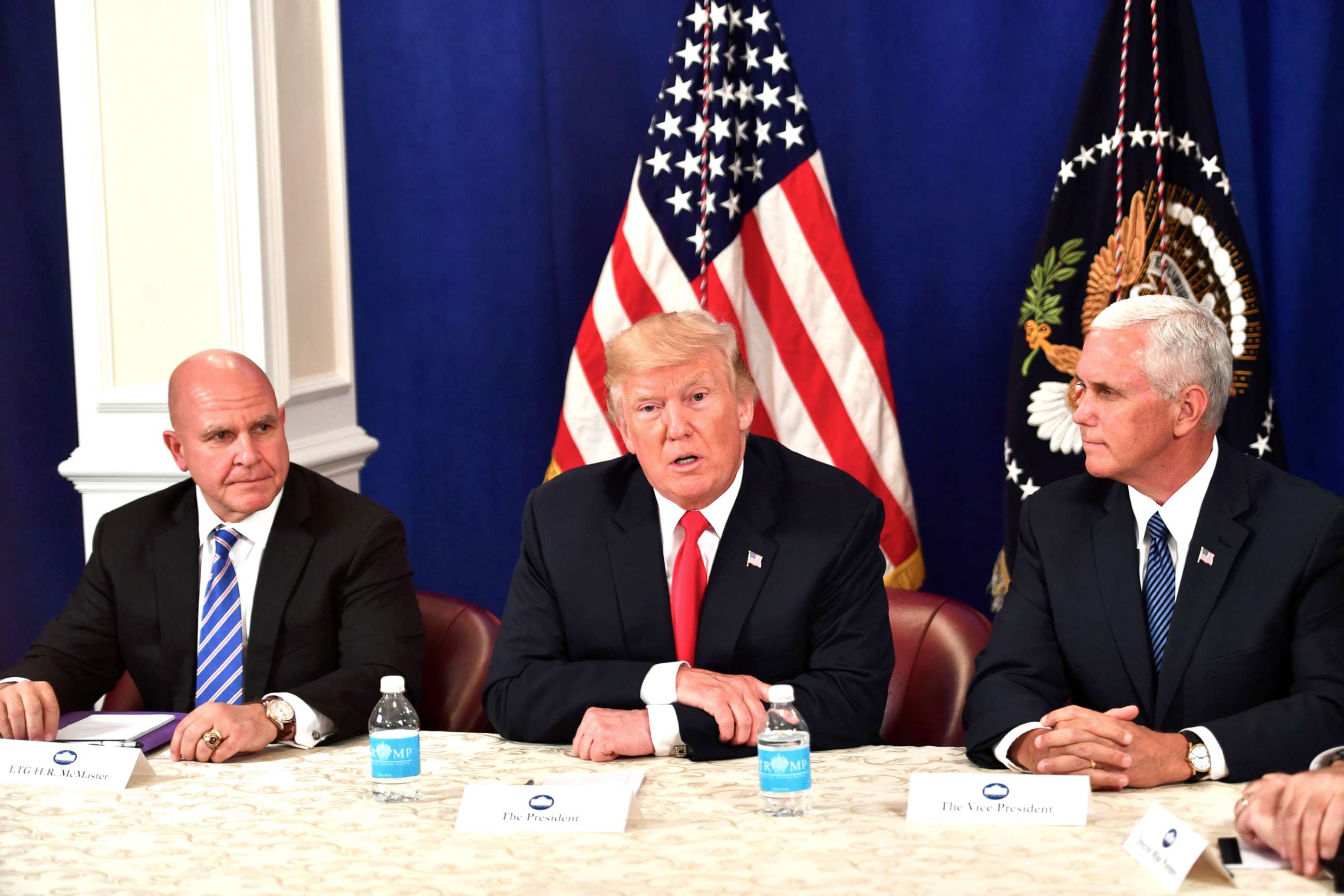 PHOTO: President Donald Trump, with National Security Advisor H. R. McMaster (L) and Vice President Mike Pence, speaks during a security briefing on Aug. 10, 2017, at his Bedminster National Golf Club in New Jersey. 