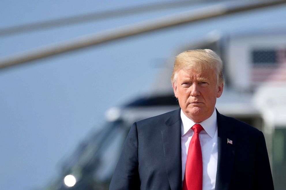 PHOTO: President Donald Trump makes his way to board Air Force One before departing from Andrews Air Force Base in Maryland, Aug. 30, 2018.