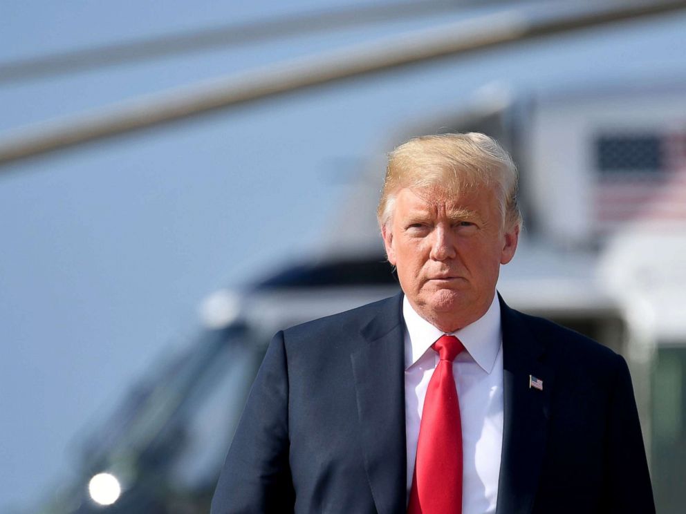 PHOTO: President Donald Trump makes his way to board Air Force One before departing from Andrews Air Force Base in Maryland, Aug. 30, 2018.