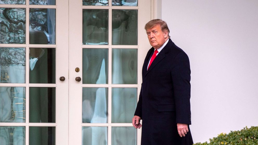 PHOTO: In this Dec. 31, 2020, file photo, President Donald Trump walks to the Oval Office after he and First Lady Melania Trump arrive on the South Lawn of the White House after returning from Florida, in Washington, D.C.