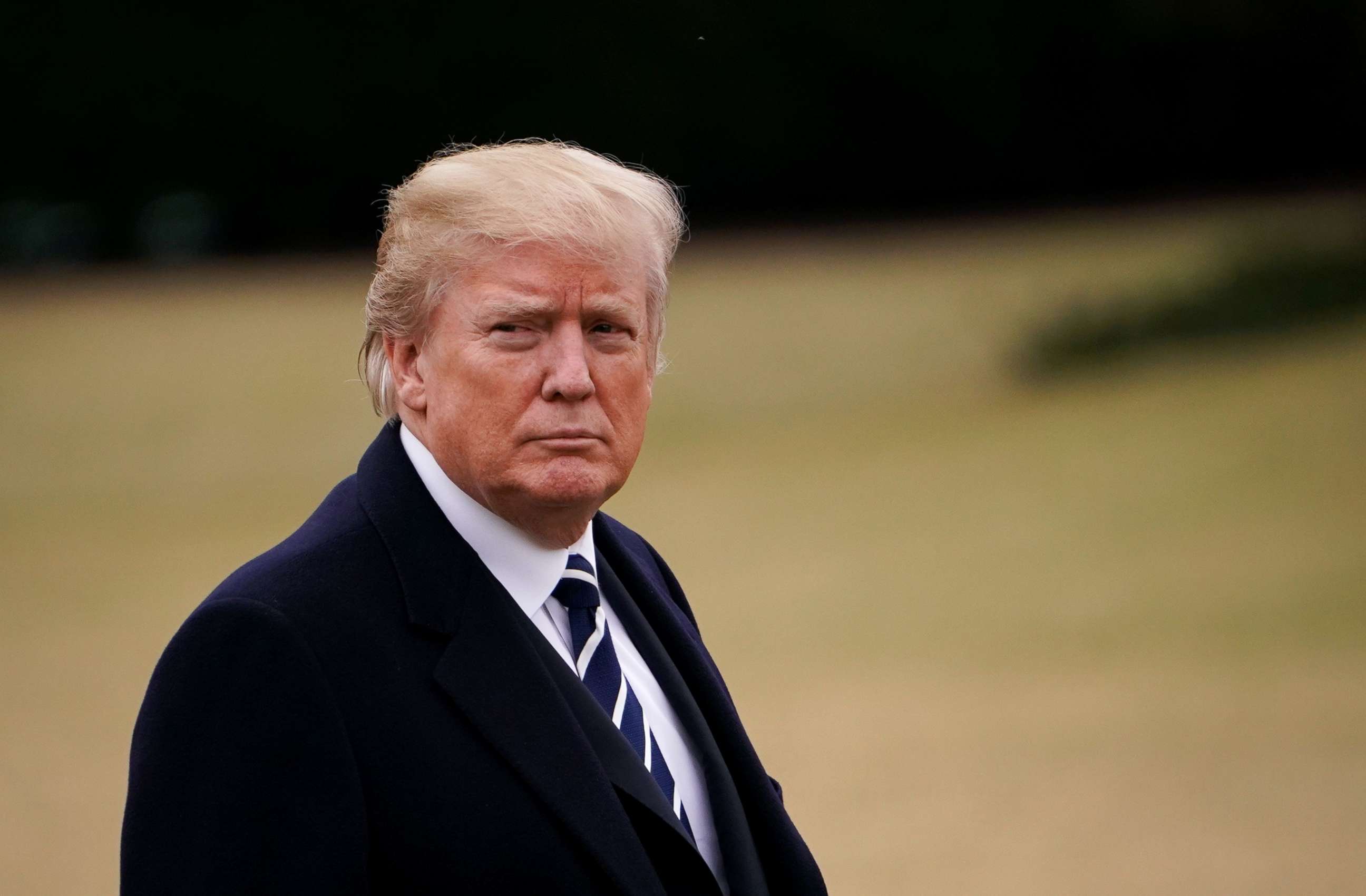 PHOTO: President Donald Trump walks across the South Lawn upon return to the White House in Washington, Feb. 1, 2018.