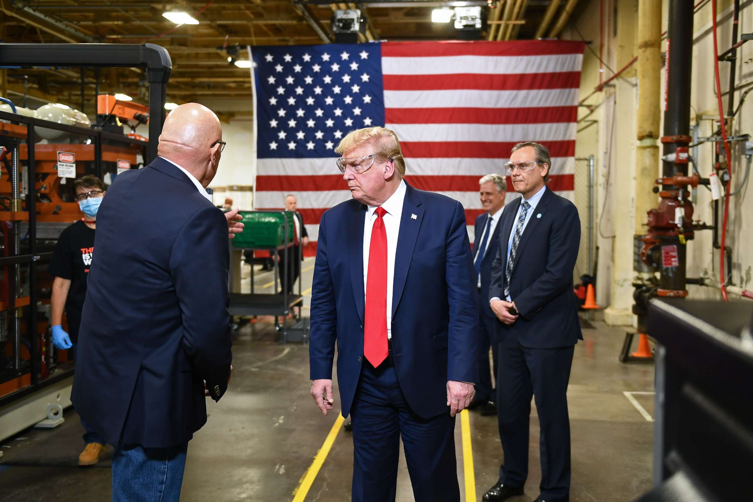 PHOTO: President Donald Trump participates in a tour of a Honeywell International plant that manufactures personal protective equipment in Phoenix, on May 5, 2020.