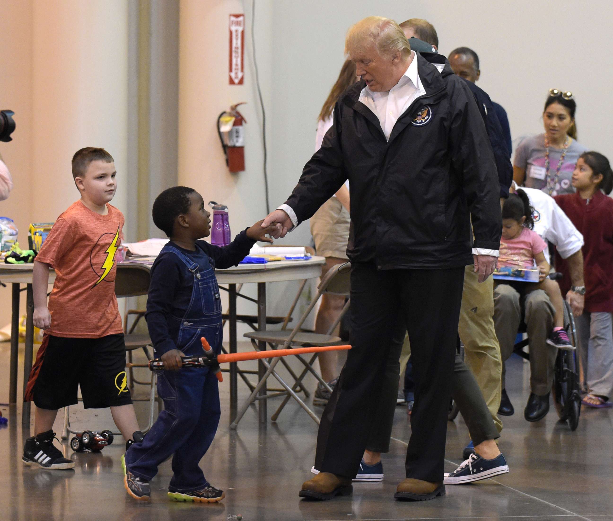 PHOTO: President Donald Trump meets people impacted by Hurricane Harvey during a visit to the NRG Center in Houston, Sept. 2, 2017. 