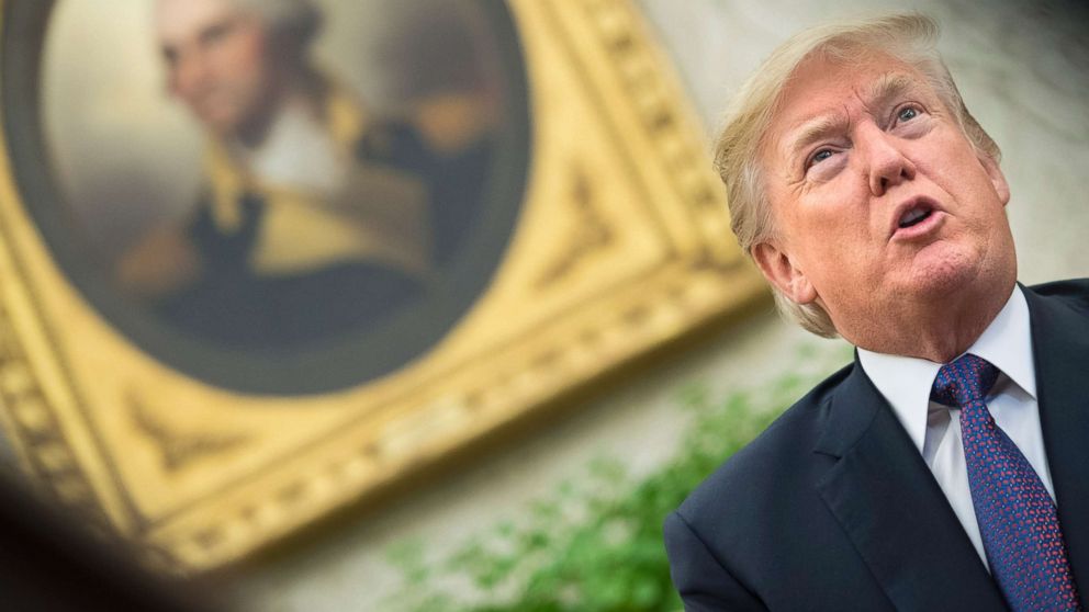 President Donald Trump speaks to the media during a meeting with Governor Ricardo Rossello of Puerto Rico, in the Oval Office at the White House, Oct. 19, 2017, in Washington. 