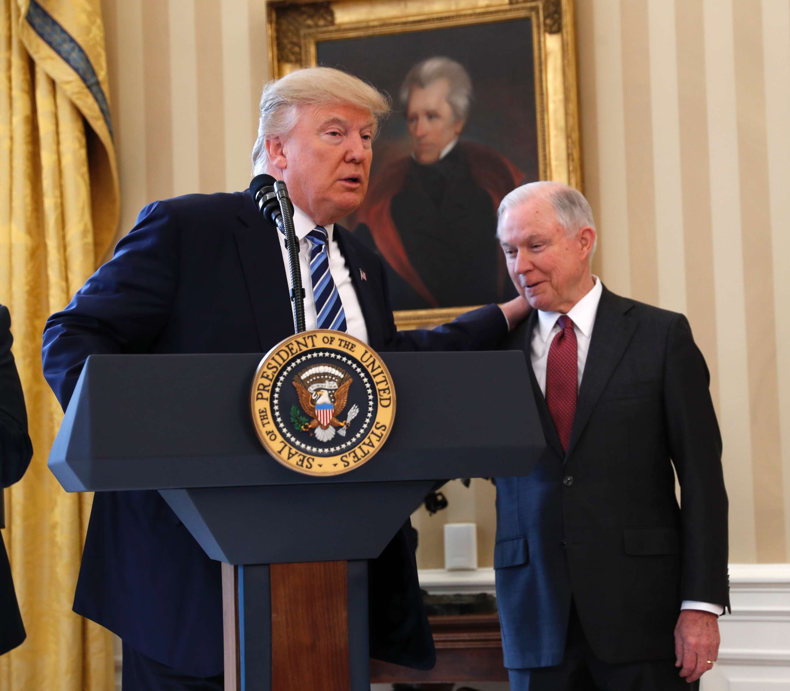 PHOTO: President Donald Trump talks to Attorney General Jeff Sessions in the Oval Office of the White House in Washington, Thursday, Feb. 9, 2017, before Vice President Mike Pence administered the oath of office Sessions.