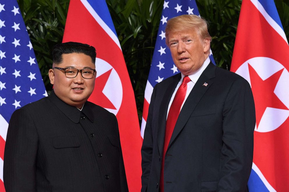 PHOTO: U.S. President Donald Trump meets with North Korea's leader Kim Jong Un at the start of their historic US-North Korea summit, at the Capella Hotel on Sentosa island in Singapore on June 12, 2018.